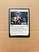 Front of Gods Willing card showing artwork, card text, set symbol