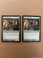 Both Leafcrown Dryad cards front view