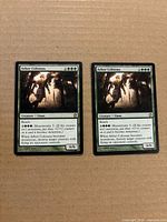 Both Arbor Colossus cards front view