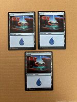 Front view of all three Island cards laid out