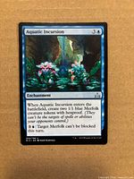 Front of Aquatic Incursion card showing artwork, mana cost, text box and set number