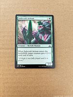 Card front showing title, artwork, stats, and condition