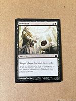 Front of Mind Rot card showing art, mana cost, text and condition