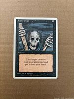 Front of Raise Dead card showing artwork, title, mana cost, text box, artist credit and 1995 copyright