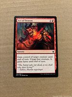 Front of Act of Treason card showing artwork, mana cost, text, set code
