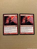 Both Act of Treason cards front view