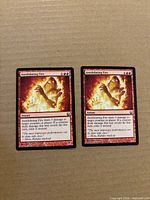 Two Annihilating Fire cards front view