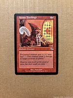Front view of Arcane Teachings card showing artwork, mana cost, text box, set symbol and collector number