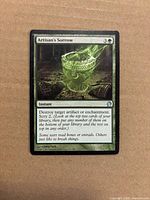 Front of the Artisan's Sorrow card showing artwork, mana cost, text box and wear on edges
