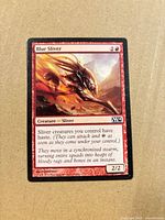 Front of Blur Sliver card showing artwork, mana cost, text, set code M14 and wear on edges
