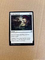 Front of Bright Reprisal card showing artwork, mana cost, text, visible wear