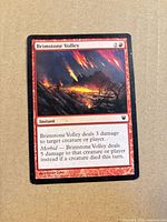 Front of Brimstone Volley card showing title, mana cost, artwork and text
