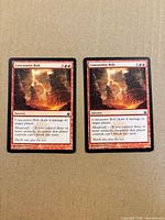 Front view of both Concussive Bolt cards