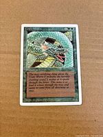 Front of Craw Wurm card showing artwork, mana cost 4GG, power/toughness 6/4