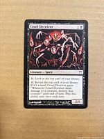 Front of Cruel Deceiver card showing artwork, text, power/toughness
