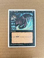 Front of Dark Ritual card showing artwork, text, border wear