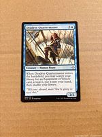 Front of Deadeye Quartermaster card showing artwork, mana cost 3U, 2/2 stats