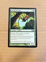 Front of Deadly Recluse card showing artwork, mana cost, stats, non-foil surface