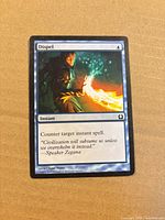 Front of Dispel card showing artwork, title, mana symbol, text box