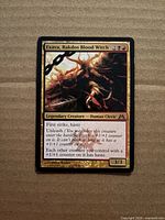 Front of Exava, Rakdos Blood Witch card showing artwork, title, mana cost, type line and text box
