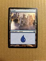 Front of Island card showing artwork, title, mana symbol, collector info