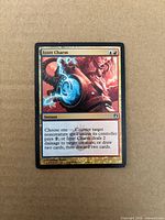 Front of foil Izzet Charm card showing artwork, title, mana cost and rules text