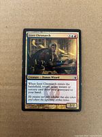 Front of Izzet Chronarch card showing artwork, text, foil surface