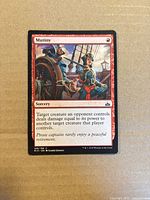 Front view of Mutiny card showing artwork, title, mana cost, text box and set info