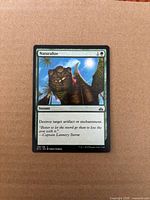 Front of Naturalize card displaying artwork, mana cost, text box