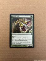Front of Nessian Asp card showing artwork, mana cost, text, power/toughness