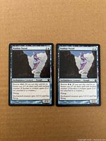 Both foil Nimbus Naiad cards front view