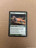 Front of Rootwalla card showing artwork, mana cost, text, set code, and visible edge wear