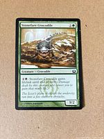 Front of Stonefare Crocodile card showing artwork, mana cost, text box, power/toughness