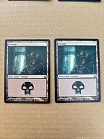 Front view of both Swamp cards