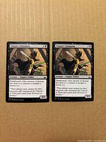 Front view of both Vampire Champion cards showing artwork, text, set symbol, and light play condition