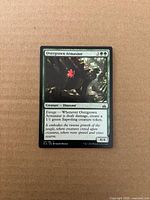 Front of Overgrown Armasaur card showing artwork and text