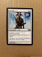 Front of Pacifism card showing title, mana cost, art, type line and text box