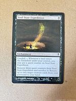 Front view of Soul Stair Expedition card showing title, artwork, text, and visible creases