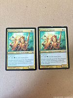 Front view of both Steward of Valeron cards side by side