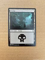 Front of Swamp card showing artwork and text