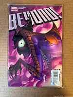Front cover of Beyond #4 comic in bag with board