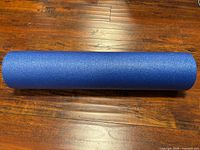Side view of full blue foam roller