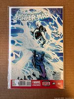 Front view of bagged The Amazing Spider-Man #2 foil variant comic