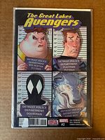 Front cover showing title, characters, issue number, bag and board