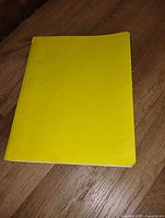 Closed yellow binder front cover