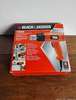Front of retail box displaying Black & Decker HG1300 1350W heat gun