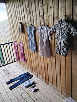 Full view of all clothing items laid out and hung