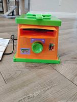 Front view of Toymax Creepy Crawlers oven showing controls and logo.