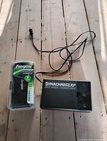 Dynacharge XP charger and packaged Energizer charger overall view