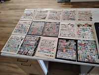 Overview of multiple album pages filled with assorted world stamps